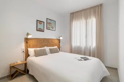 Cama o camas de una habitación en Calella Apartments by Olala Homes