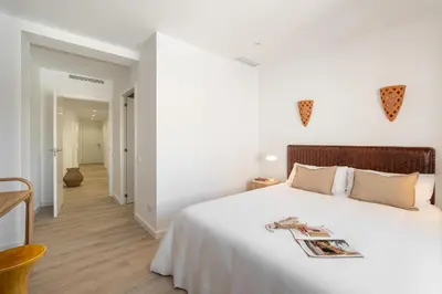 Cama o camas de una habitación en Calella Apartments by Olala Homes