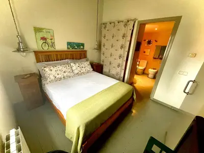 Cama o camas de una habitación en Casa familiar duplex y parking gratis