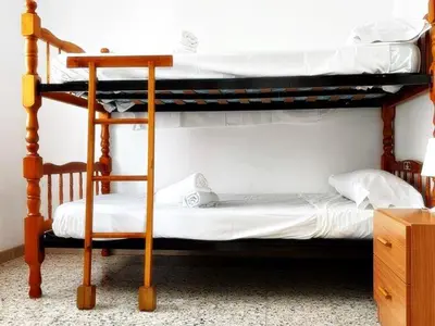 Cama o camas de una habitación en AFRODITA Casa con dos apartamentos independientes