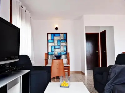 Una televisión o centro de entretenimiento en AFRODITA Casa con dos apartamentos independientes