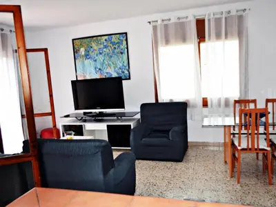 Una televisión o centro de entretenimiento en AFRODITA Casa con dos apartamentos independientes