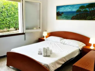 Cama o camas de una habitación en AFRODITA Casa con dos apartamentos independientes