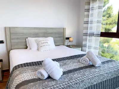 Cama o camas de una habitación en Villa Violetas - Magnificent sea view, 8 pers and baby cot available, quiet area