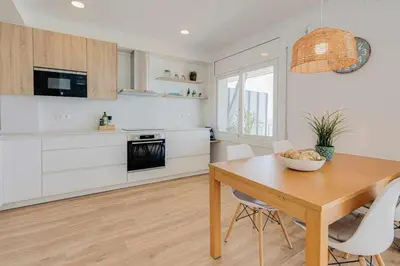 Una cocina o zona de cocina en BA - Primera Linea - Neptuno