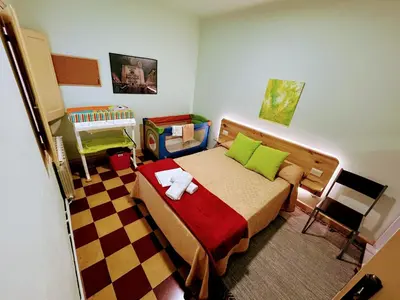 Cama o camas de una habitación en Girona Centro 7pax (3º) Parking* Car,Moto,Bike