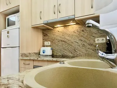 Una cocina o zona de cocina en Ambient CostaBravaSi