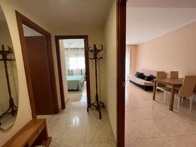 Cama o camas de una habitación en Camelia Apartment