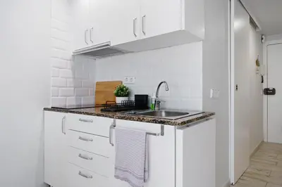 Una cocina o zona de cocina en Hauzify I Apartament Turismar