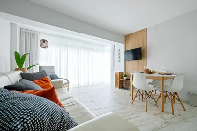 Una televisión o centro de entretenimiento en Hauzify I Apartament Turismar