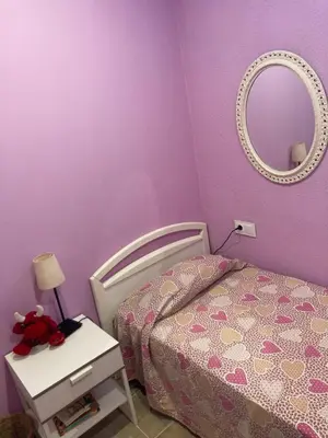 Cama o camas de una habitación en Casa con vista y jardín, a 20' de la playa