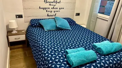 Cama o camas de una habitación en Apartamento playa