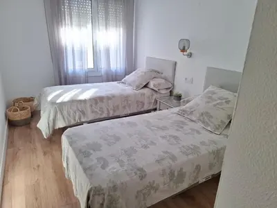 Cama o camas de una habitación en Apartamento vacacional Piscis
