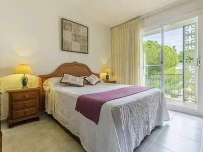 Cama o camas de una habitación en Piso ideal para dos con balcón Platja d'Aro