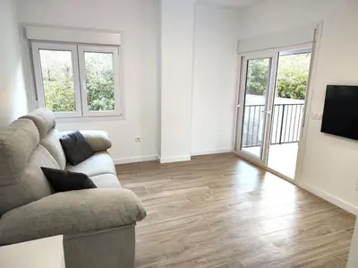 Una televisión o centro de entretenimiento en Apartamento Galiria, Pals