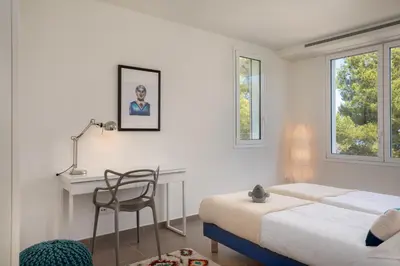 Cama o camas de una habitación en Villa Verde Costa Brava - BY EMERALD STAY