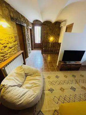 Una televisión o centro de entretenimiento en Casa de pueblo en Palamós