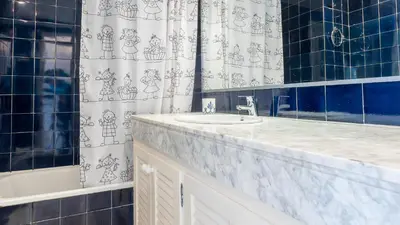 Un baño de GERANIS