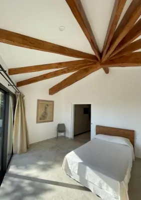 Cama o camas de una habitación en ESCAPADA