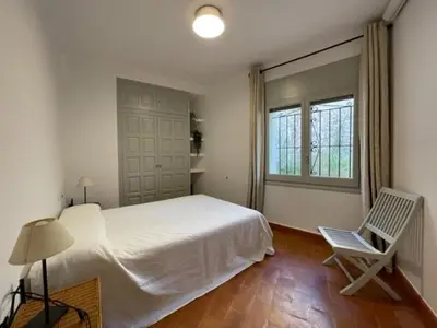 Cama o camas de una habitación en ESCAPADA