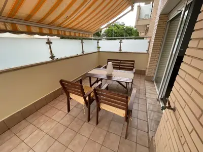 Un balcón o terraza de 70m2 Apt 2bedrooms 25m2Terrace, 4Pools, 3min beach