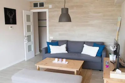 Zona de estar de Lloret de Mar - BeachSide Apartment - Free Parking - limited size car