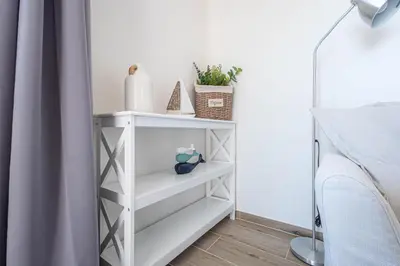 Cama o camas de una habitación en Hauzify I Apartaments Can Pi