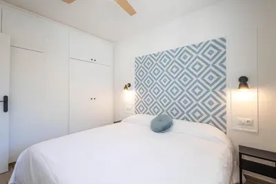 Cama o camas de una habitación en Hauzify I Apartaments Can Pi