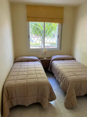 Cama o camas de una habitación en Amplio Apartamento con acceso directo a piscina