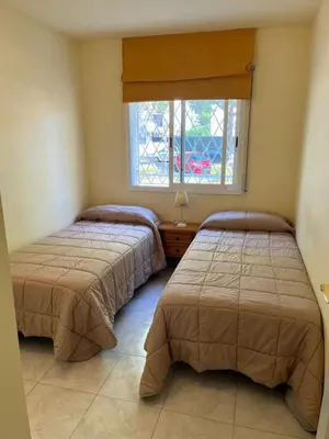 Cama o camas de una habitación en Amplio Apartamento con acceso directo a piscina