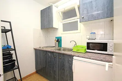 Una cocina o zona de cocina en Apartaments Nàutic