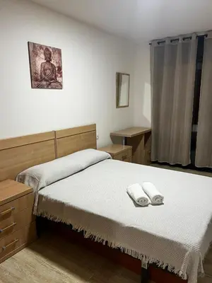 Cama o camas de una habitación en Central Apartment