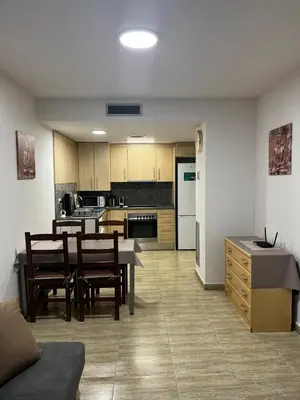 Una cocina o zona de cocina en Central Apartment