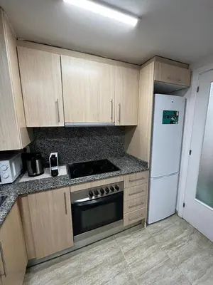 Una cocina o zona de cocina en Central Apartment