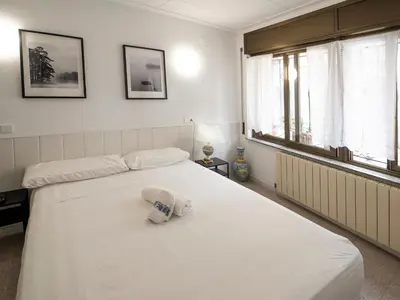 Cama o camas de una habitación en L'Hostalet GuestHouse