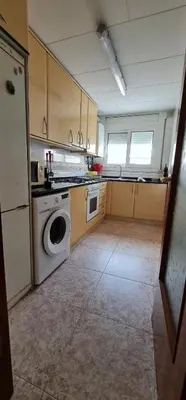 Una cocina o zona de cocina en Precioso apartamento con piscina