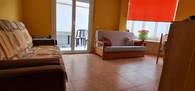 Zona de estar de Precioso apartamento con piscina