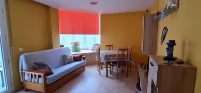 Zona de estar de Precioso apartamento con piscina