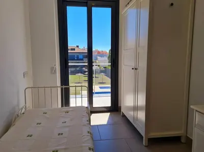 Cama o camas de una habitación en Apartamento nuevo en Sant Antoni de Calonge