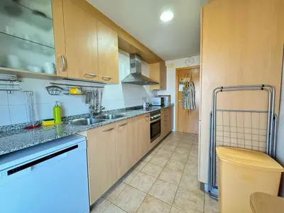 Una cocina o zona de cocina en RESIDENTIAL FLAT Lloret de Mar (Nex