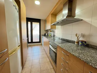 Una cocina o zona de cocina en RESIDENTIAL FLAT Lloret de Mar (Nex