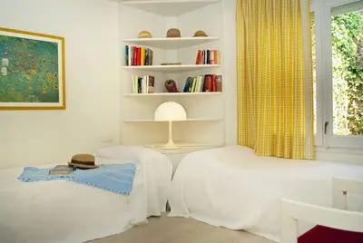 Cama o camas de una habitación en Beach apartment overseeing the sea