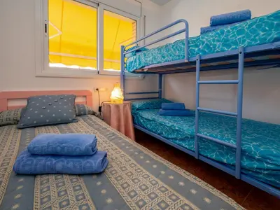 Cama o camas de una habitación en Apartment Colom by Interhome
