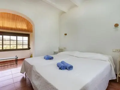 Cama o camas de una habitación en Holiday Home Can Maggi by Interhome
