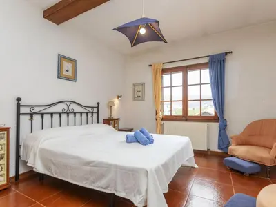 Cama o camas de una habitación en Holiday Home Can Maggi by Interhome