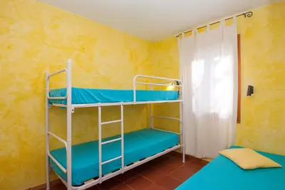 Cama o camas de una habitación en Sa Tuna 