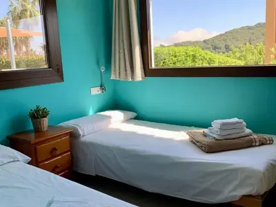 Cama o camas de una habitación en Finca Montnegre Suites and Spa