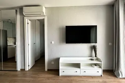 Una televisión o centro de entretenimiento en Apartamento Costa Brava, Blanes