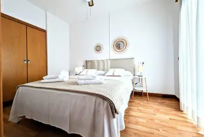 Cama o camas de una habitación en Apartamento Piscina en Platja d'Aro by Host&Joy