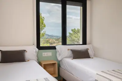 Cama o camas de una habitación en Villa Le Grá Costa Brava - BY EMERALD STAY